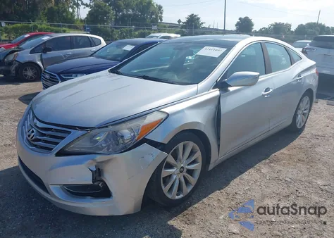 2013 Hyundai Azera z USA, uszkodzony, nr VIN KMHFH4JG8DA308809